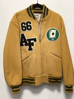 Houston brand Tan Varsity Puffer Jacket with Green Trim and Patch Details
